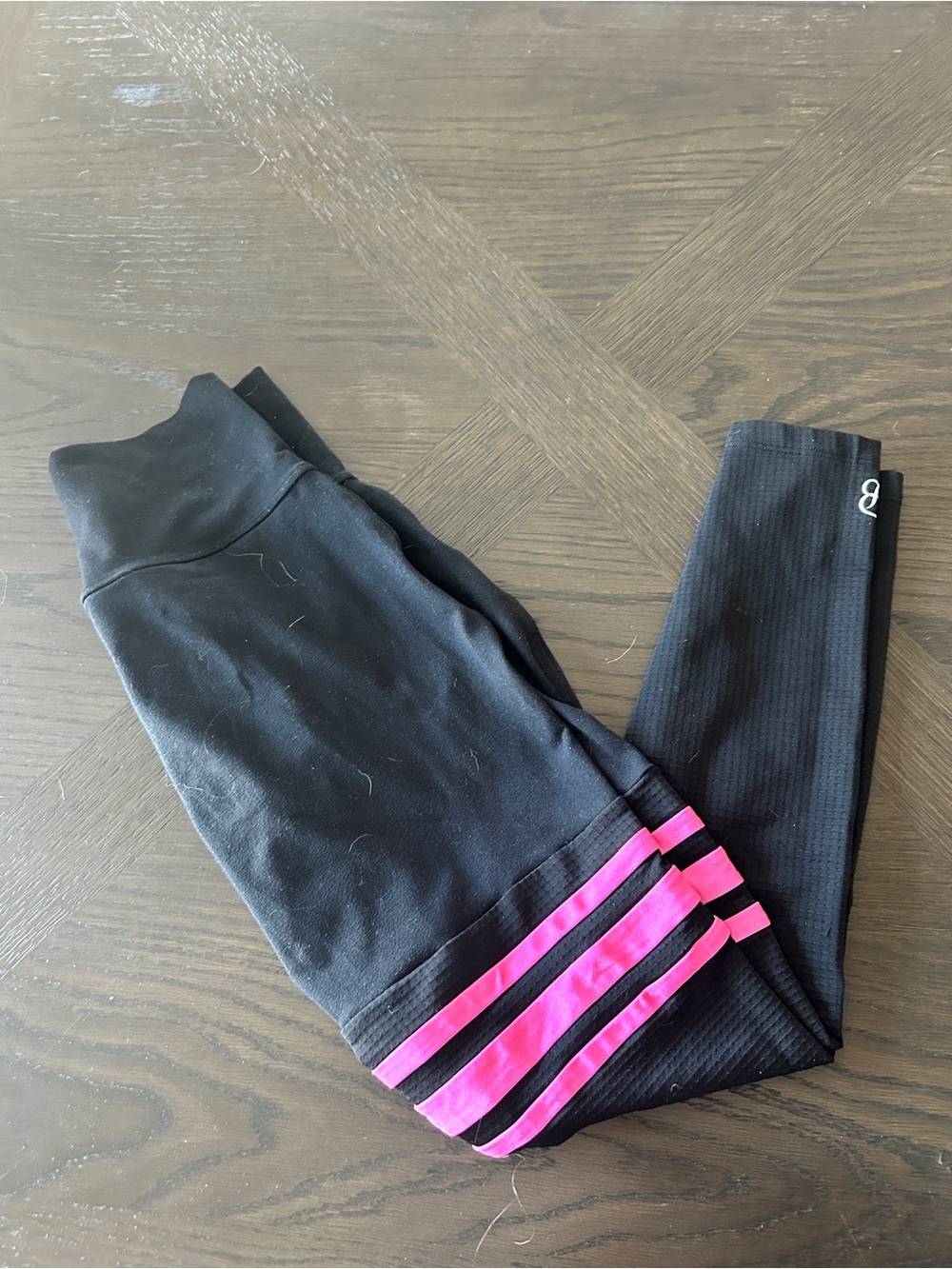 Bombshell Sportswear Black Leggings with Pink Stripe Accents